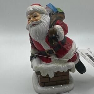 Santa clause coming down chimney. Brand new.  Hobby Lobby 4” figurine NWT